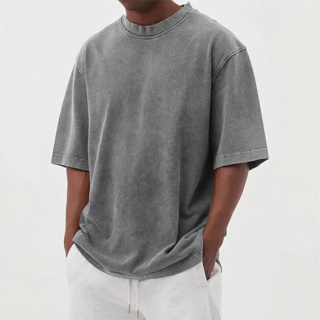 Men's stone washed distressed pullover t-shirt in loose fit with half sleeves available in eight colours