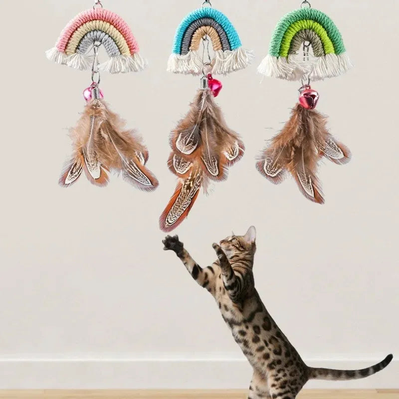 Blue elastic cat teasing stick with feather rope hanging from a door via a sticky buckle clamp