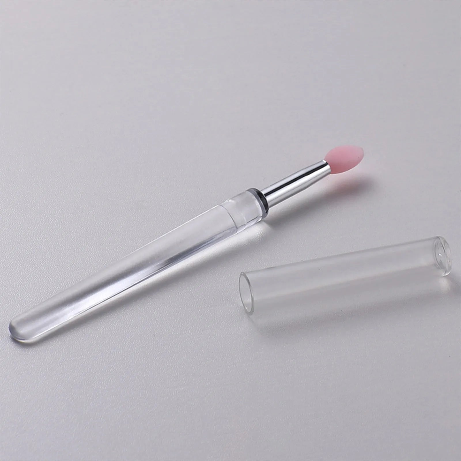 Set of reusable silicone lip brushes with protective caps in various colours