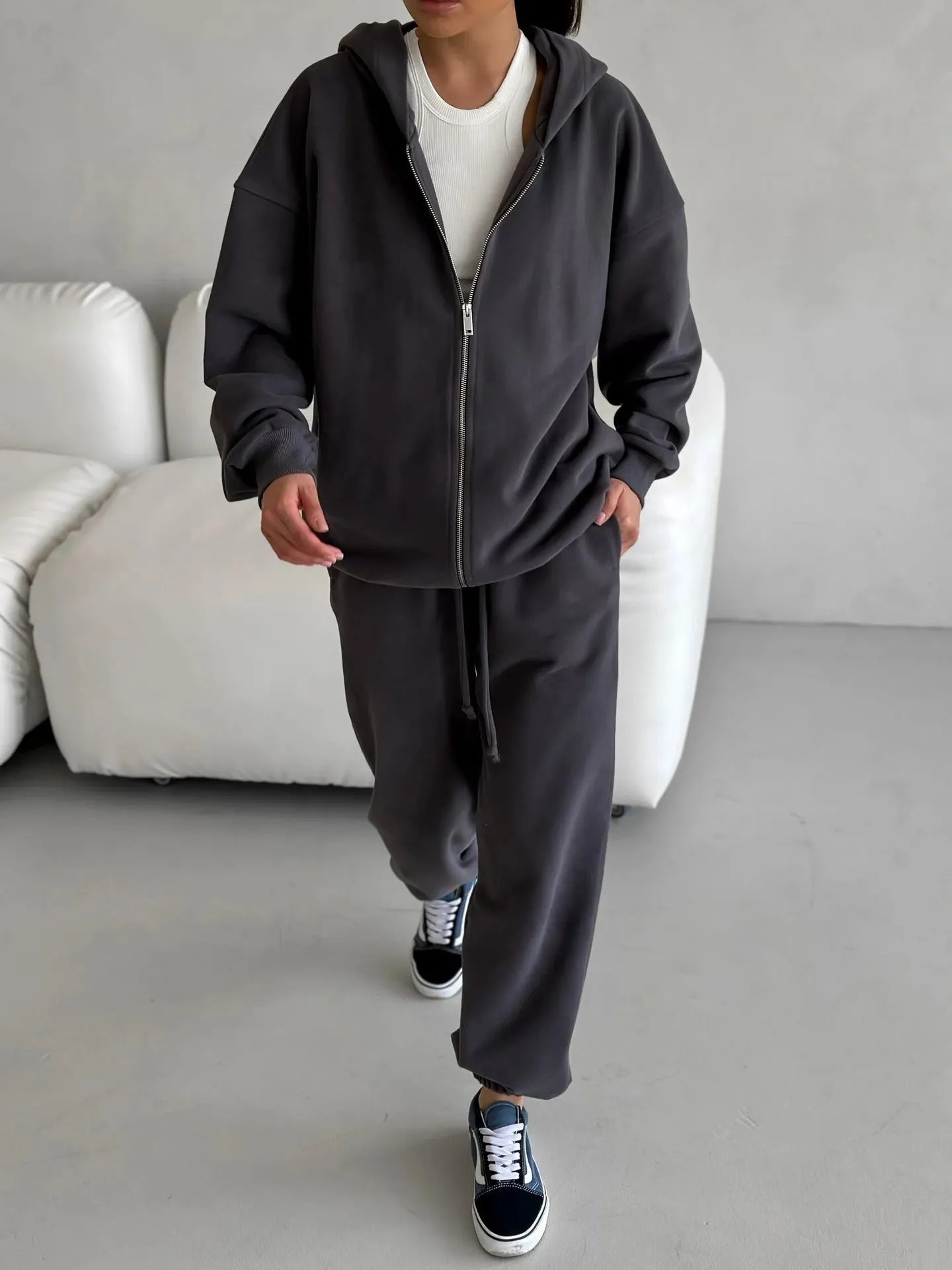 Loose fit red polyester street style coat and trousers two-piece set on a hanger