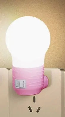 Plug-in bedside baby night feeding lamp in round modern design with white plastic shell