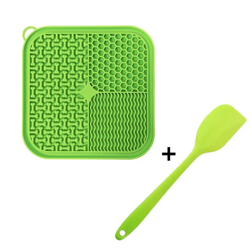 Blue silicone dog licking mat with textured pattern and suction cups on back