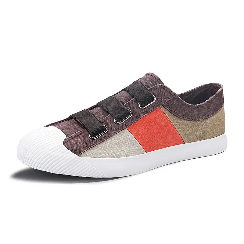 Men's low-top canvas sneakers with elastic band fastening in beige colour.