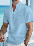 Men's loose fit linen blend short sleeve T-shirt with a stand collar in a light colour.