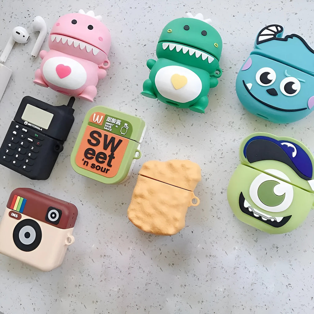 Green silicone AirPods case with a cartoon animal design, compatible with AirPods 1 and 2.