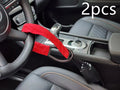 Red iron steering wheel lock with wire rope for a General Motors car.
