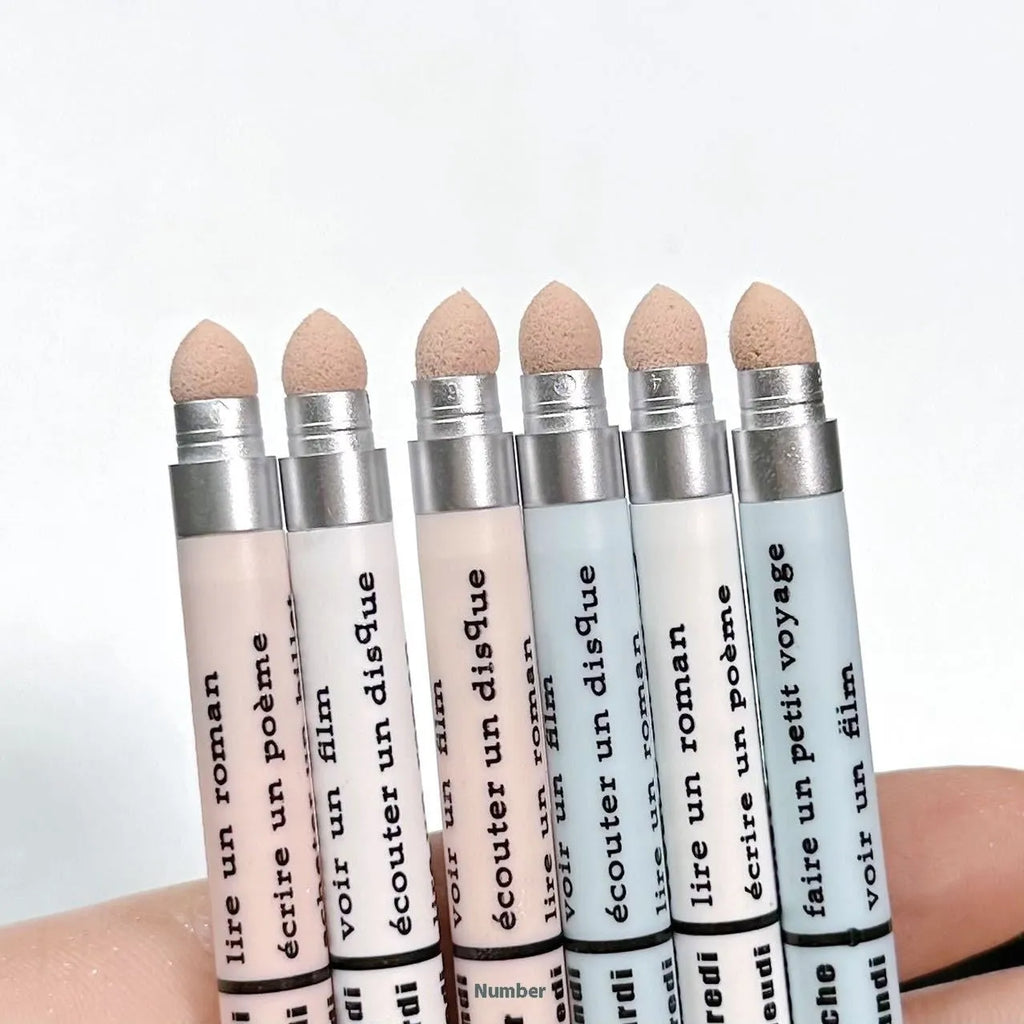 Waterproof 2-in-1 eyeliner and eyeshadow pen in assorted colours on a white background