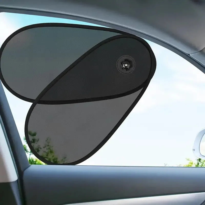 Black adjustable car side window sunshade with suction cups stretched across vehicle window