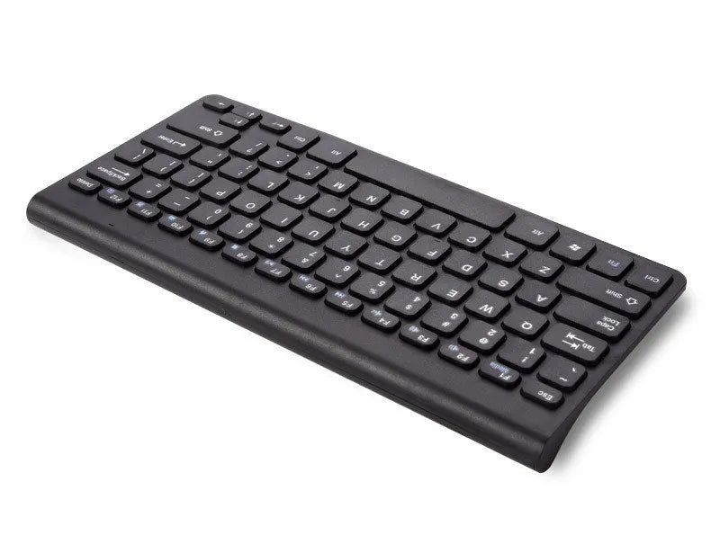 Black wireless keyboard and mouse set with 4G receiver on wooden desk