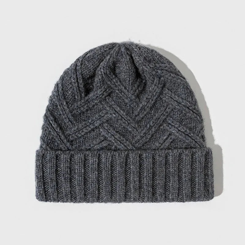 Women's wool knitted dome winter hat with a textured totem pattern.