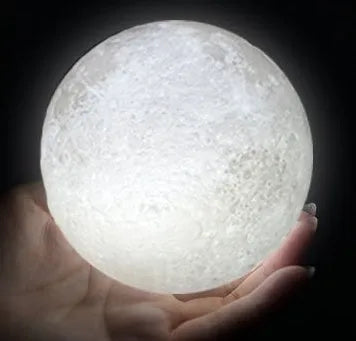 3D printed white moon lamp on wooden stand with touch metal ring at base