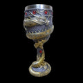 Red wine glass with gold Chinese dragon design on stainless steel stem.