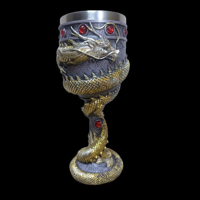 Red wine glass with gold Chinese dragon design on stainless steel stem.