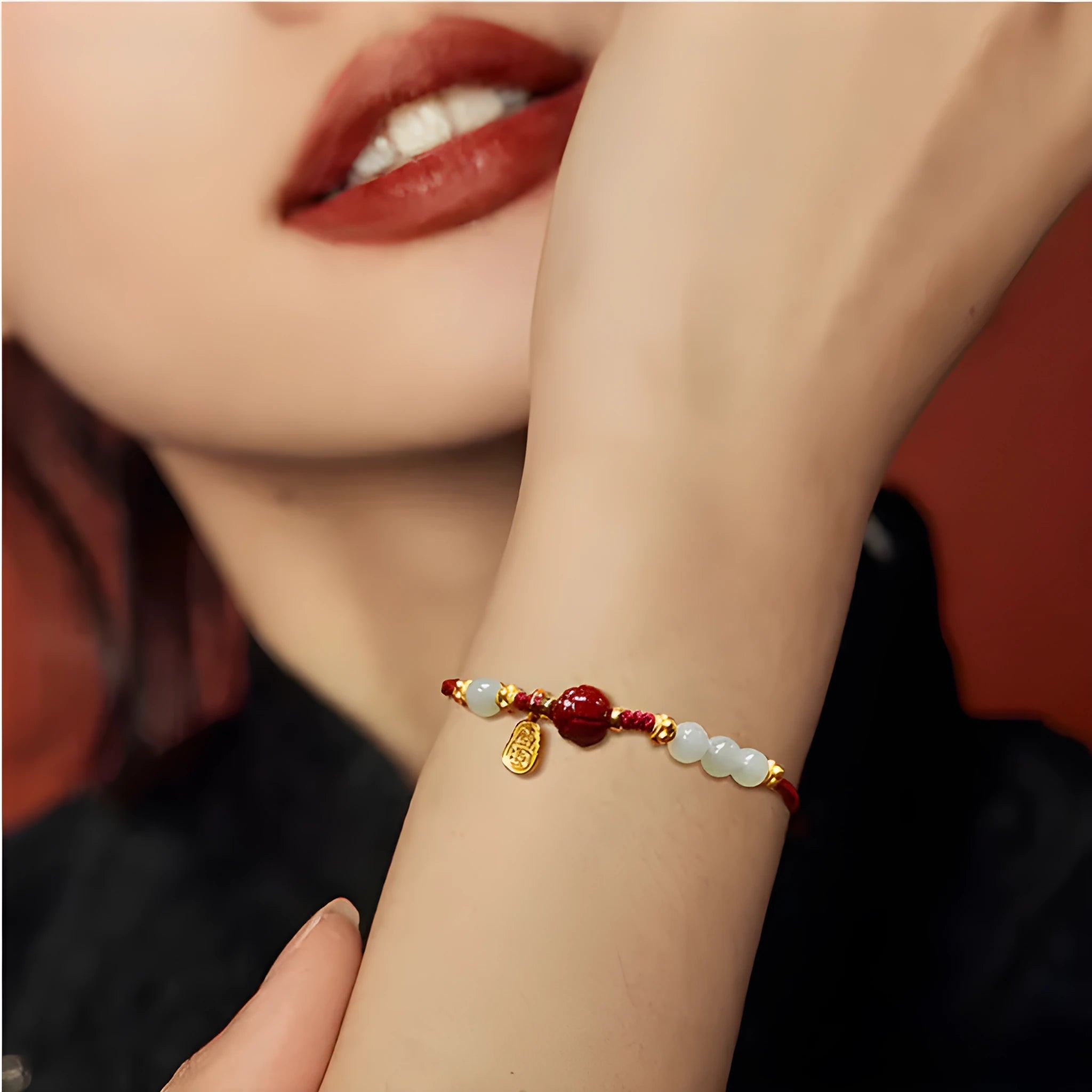 Women's Hetian jade cinnabar red rope bracelet with adjustable 925 silver chain