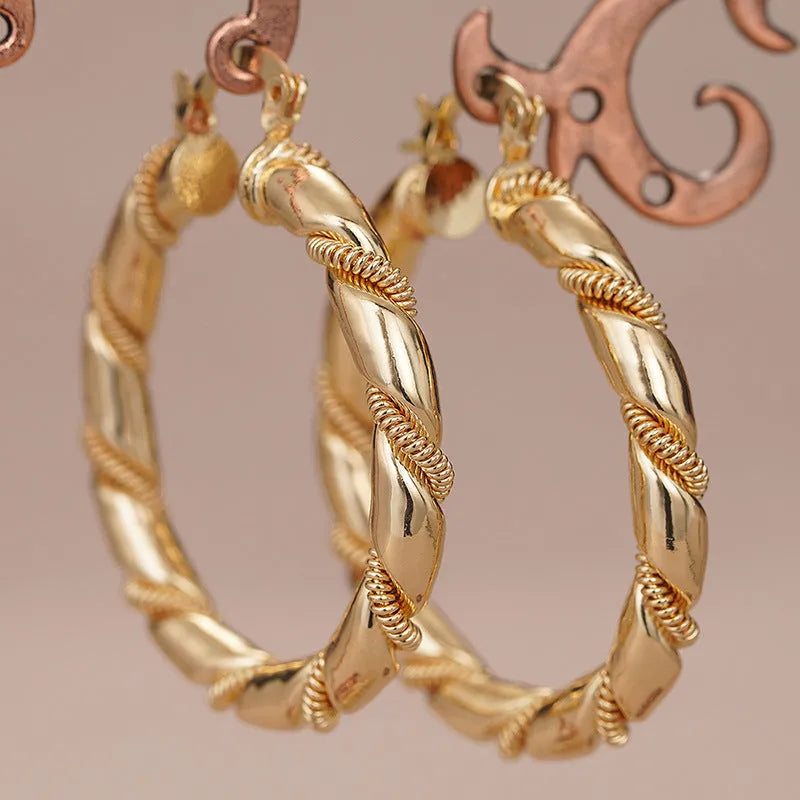 Geometric copper ear clips with ring design in golden colour for women