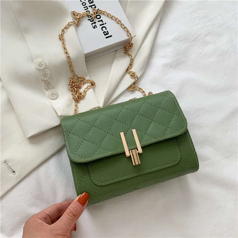 Women's PU crossbody bag with diamond lattice chain strap in minimalist solid colour design