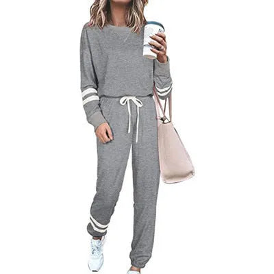Women's loose fit solid color two-piece casual suit in apricot, black, and blue sizes S to 3XL