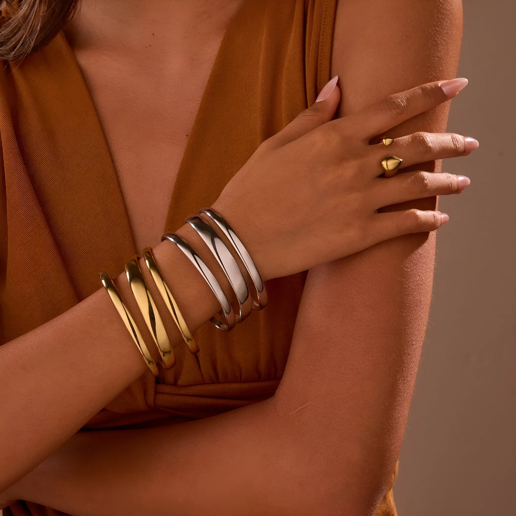 Stainless steel geometric line bracelet for women with simple opening clasp in gold or steel colour