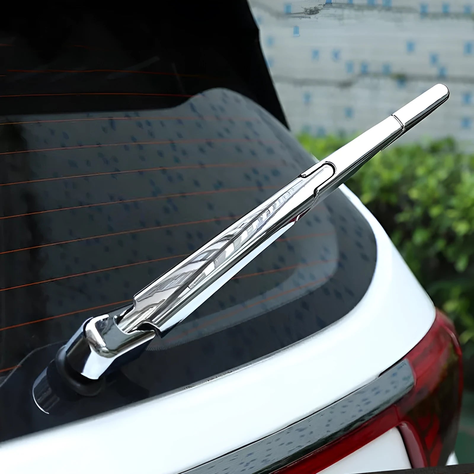 Set of four silvery ABS plastic rear wiper cover trims for a 2010 Hyundai.