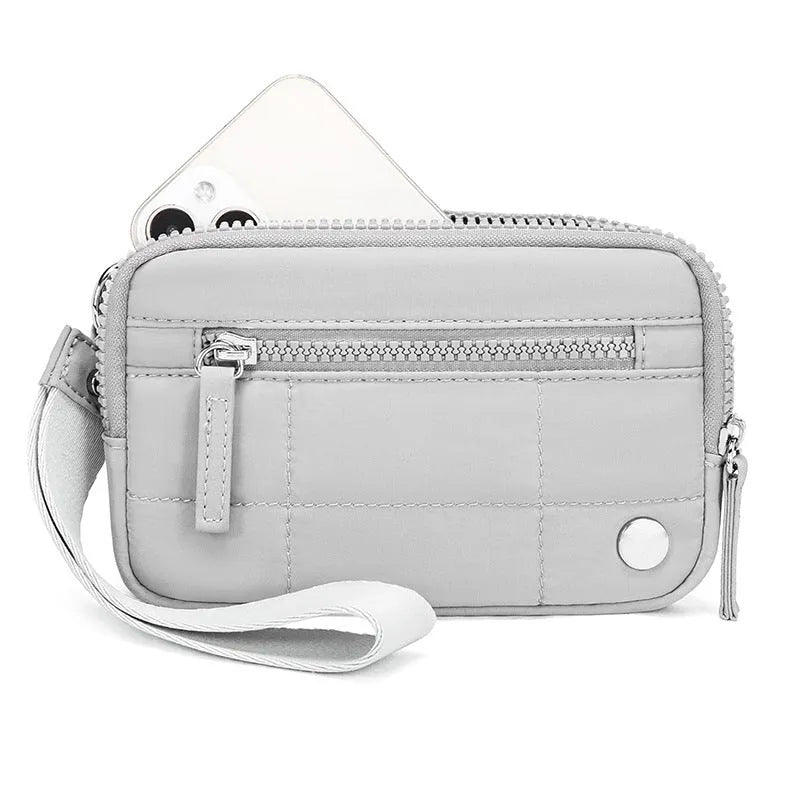 Waterproof quilted nylon handbag with transparent deck section in solid colour with urban simplicity styling