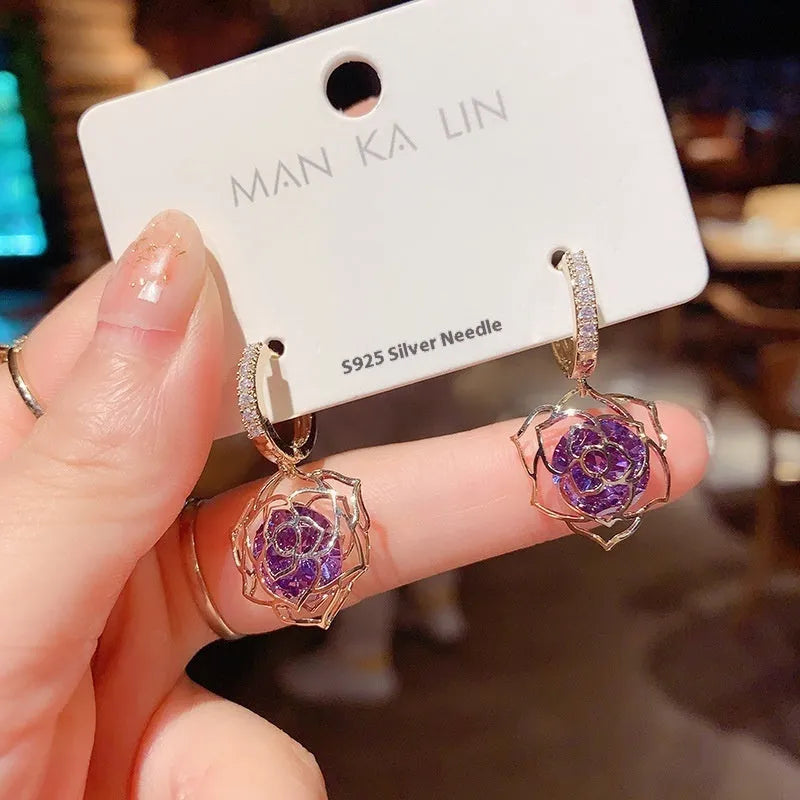 Women's zircon earrings with electroplated finish in geometric rose designs on copper