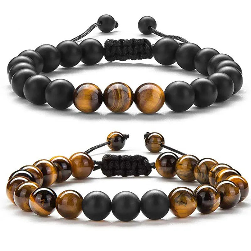 Geometric couple bracelet made of matte black agate beads with a tiger eye stone.