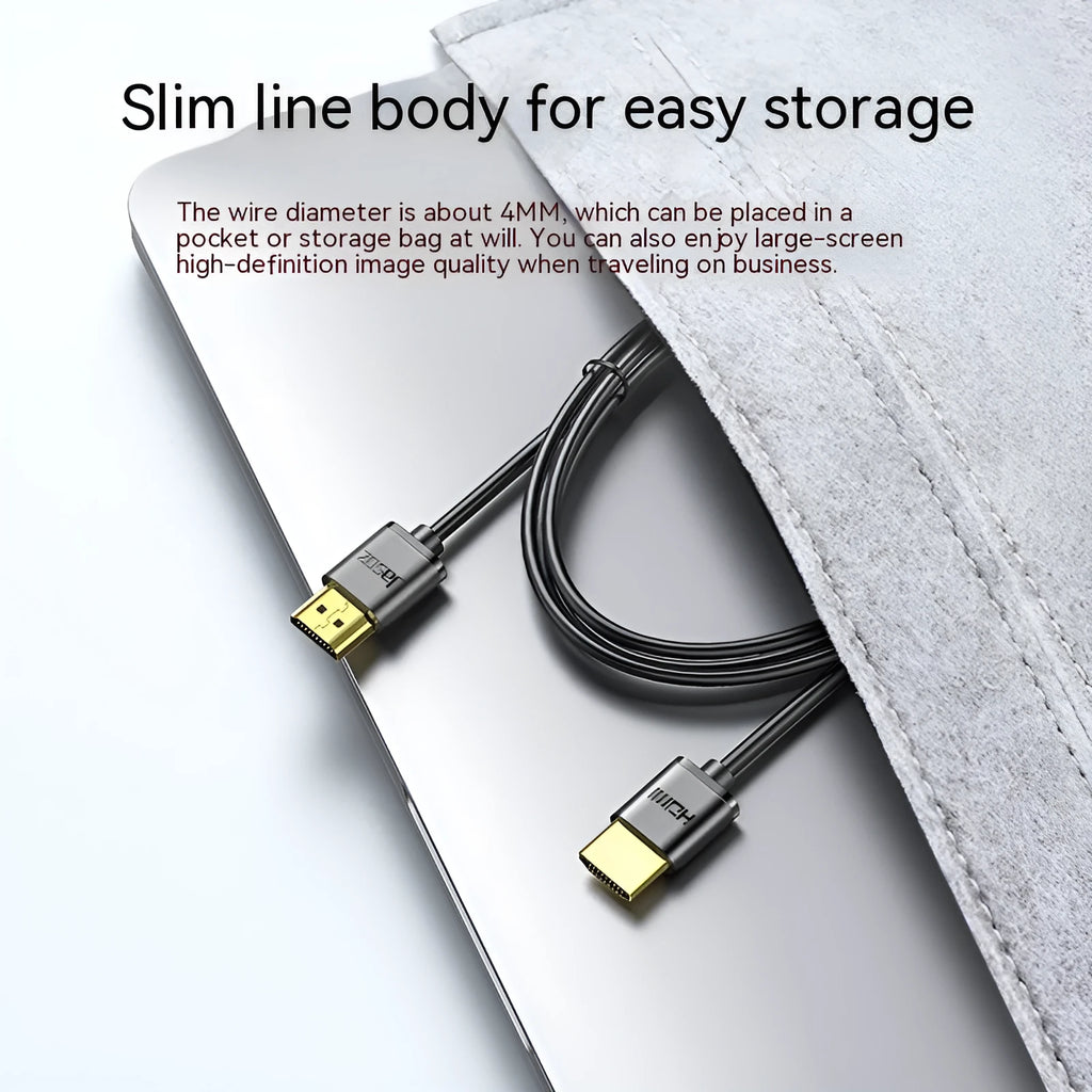 Gold-plated HDMI cable with thin black wire, shown with connector close-up highlighting contacts.