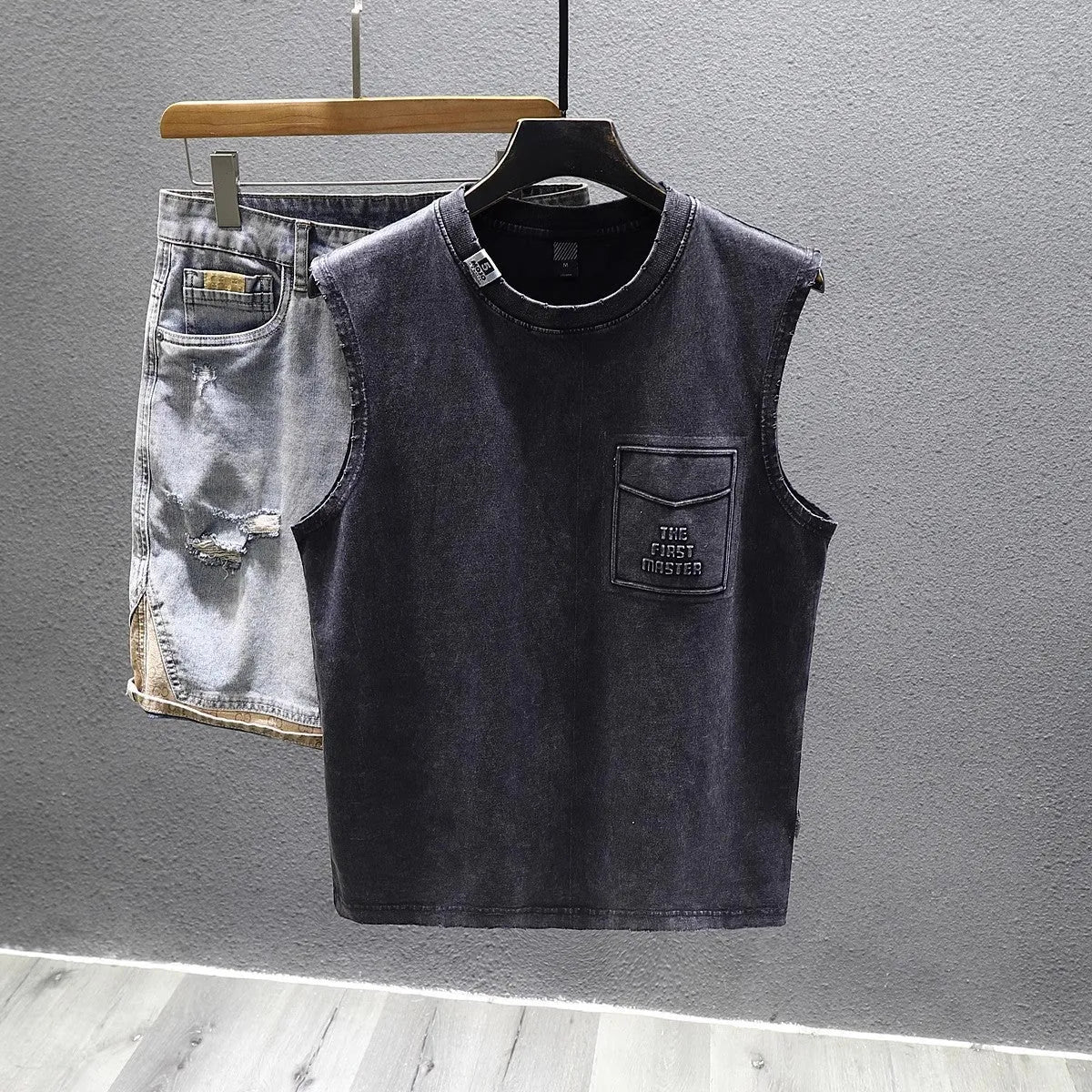 Men's loose fit cotton sleeveless t-shirt in black or white with straight hem design