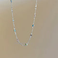 Square colour artificial crystal pendant on gold tone clavicle chain necklace with geometric design