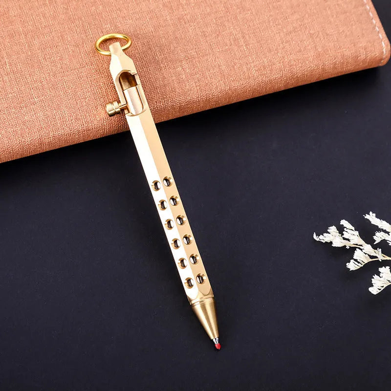 Brass hexagonal bolt pen showing six-sided shape and metallic construction with 0.5mm writing head
