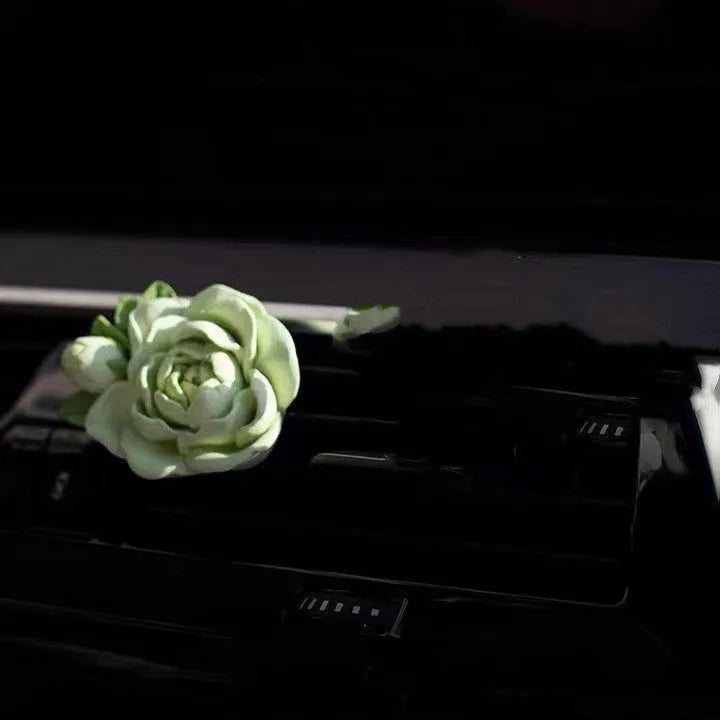 Solid jasmine car perfume for air outlet with gypsum base measuring 5 by 4.5cm