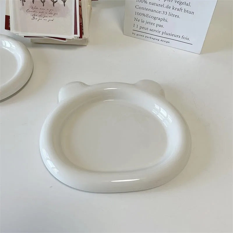 White porcelain plate with bear decoration or plain round shape, shown in 15cm and 20cm sizes.