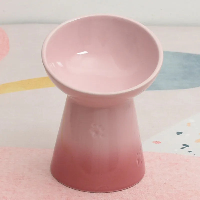 Ceramic pet bowl with anti-tumble design and raised chin support for cats and dogs