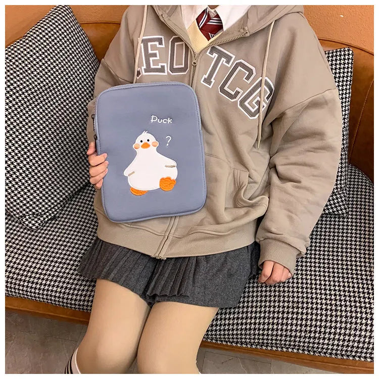 Blue tablet case with cartoon duck embroidery design and zipper closure