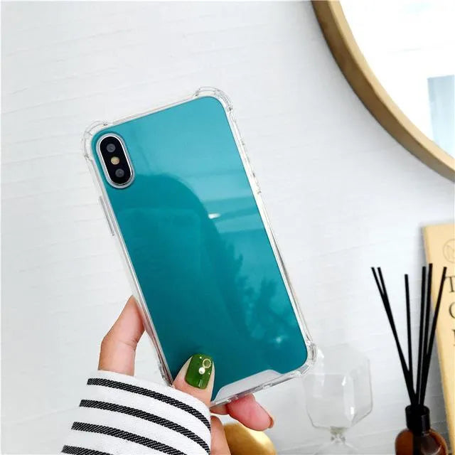 Mirror finish protective TPU case for iPhone shown in various colours.