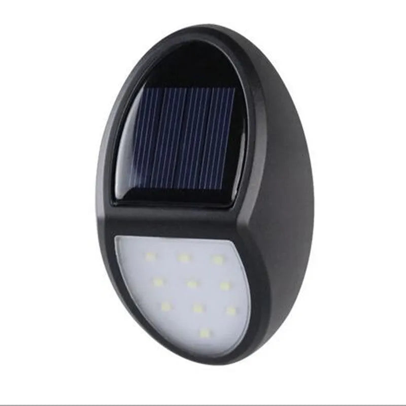 Black solar-powered LED wall light with automatic sensor measuring 75mm by 120mm