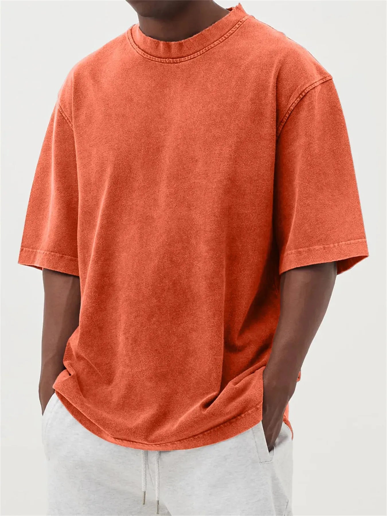 Men's stone washed distressed pullover t-shirt in loose fit with half sleeves available in eight colours