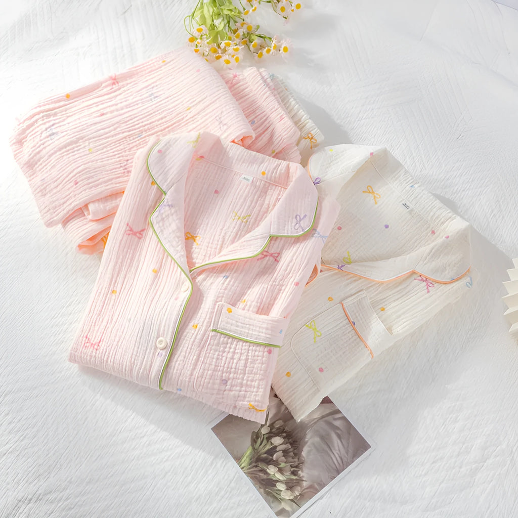 Women's cotton pajama set showing long sleeves and matching trousers in simple casual style