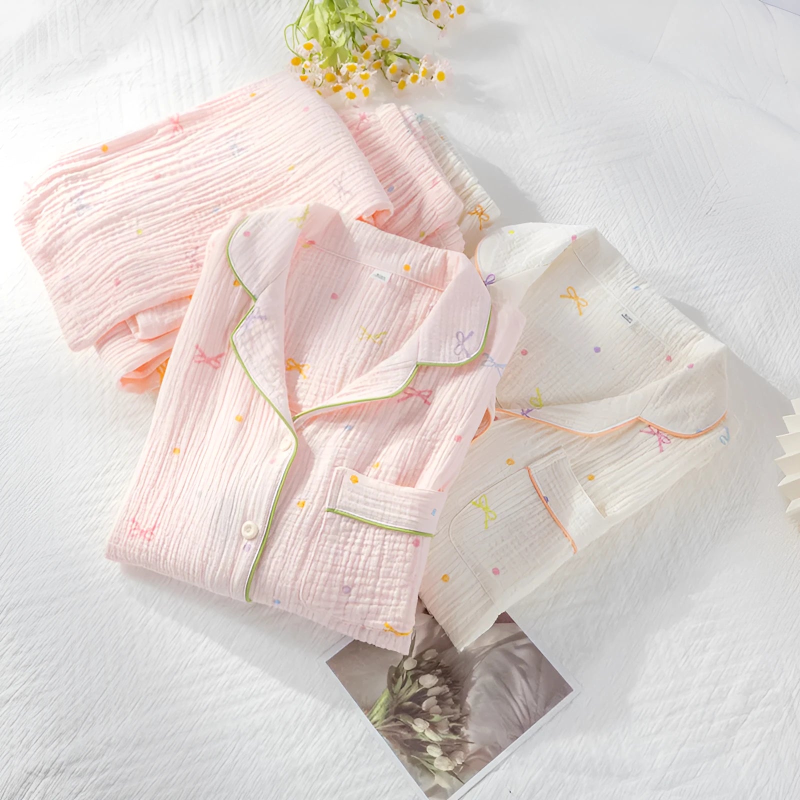 Women's cotton pajama set showing long sleeves and matching trousers in simple casual style