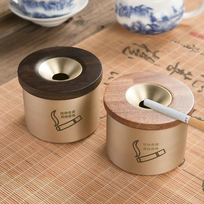 Retro-style solid copper ashtray with a wooden lid in black or red.