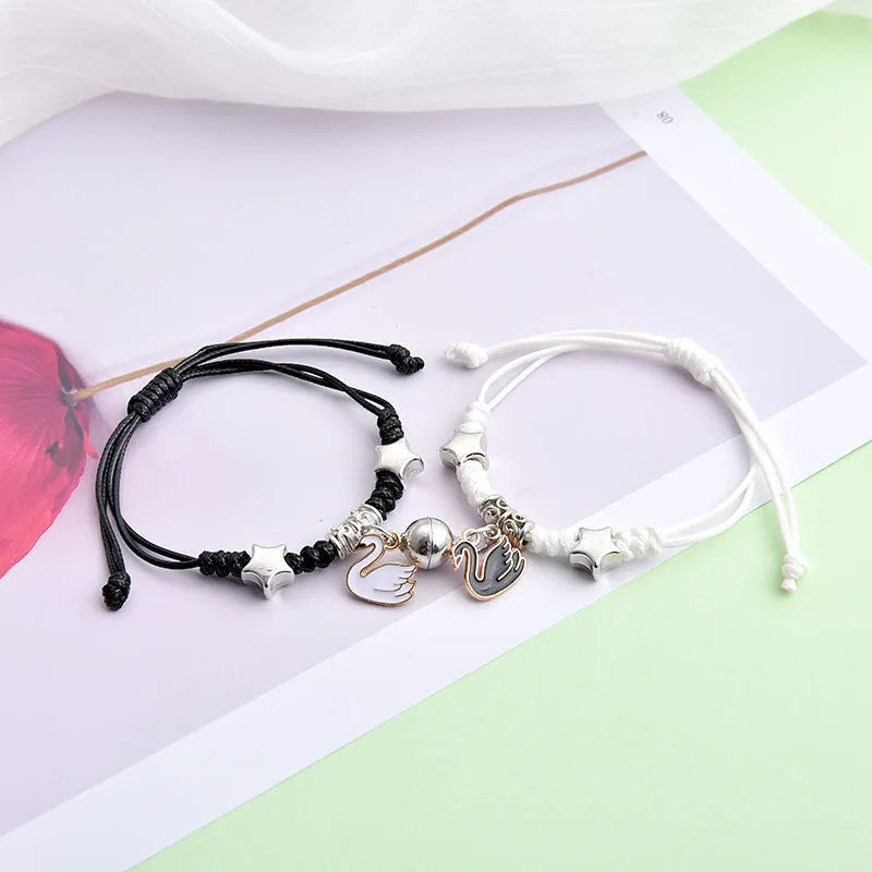 Magnetic couple bracelets with crown design and electroplating finish