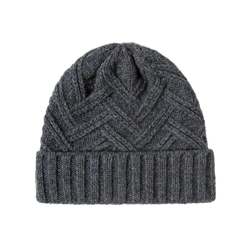 Women's wool knitted dome winter hat with a textured totem pattern.
