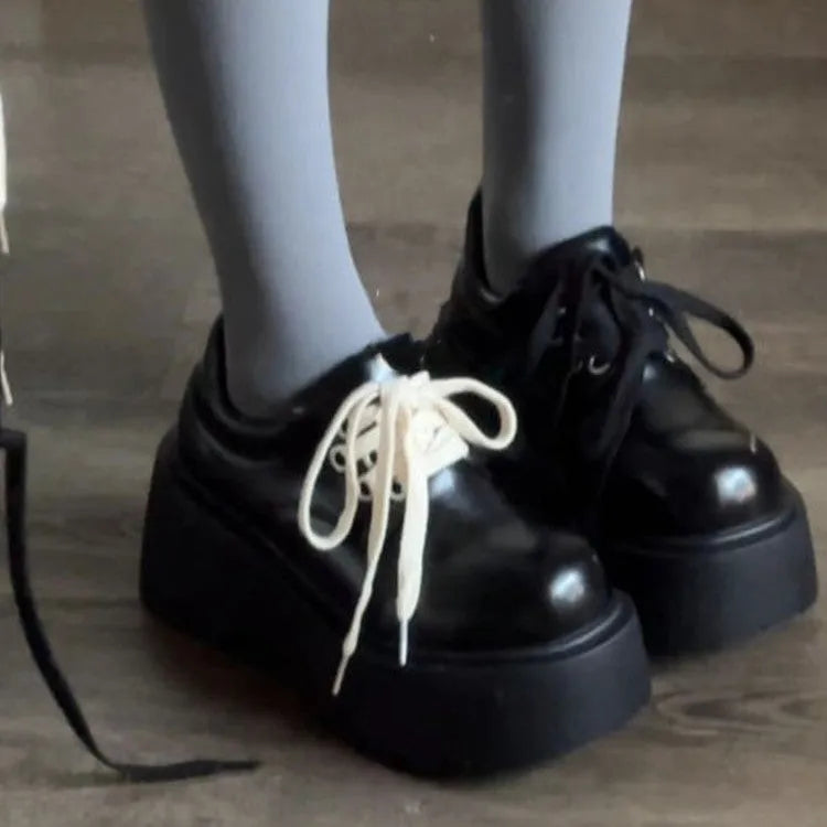 Matte black women's lace-up shoes with a chunky 6-8cm heel and round toe.