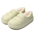 Women's waterproof garden slipper in green with plush lining and a textured non-slip EVA sole.