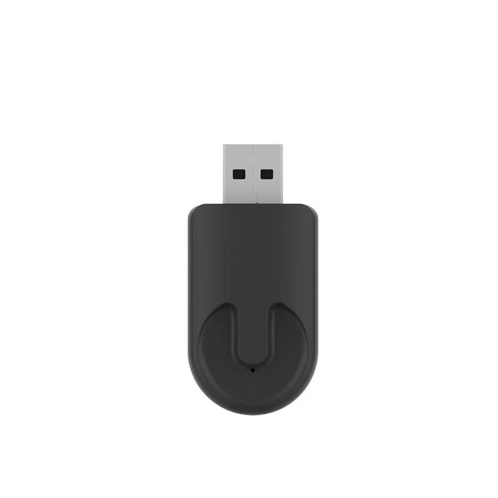 Black mini 2-in-1 CarPlay USB wireless data adapter showing compact dimensions