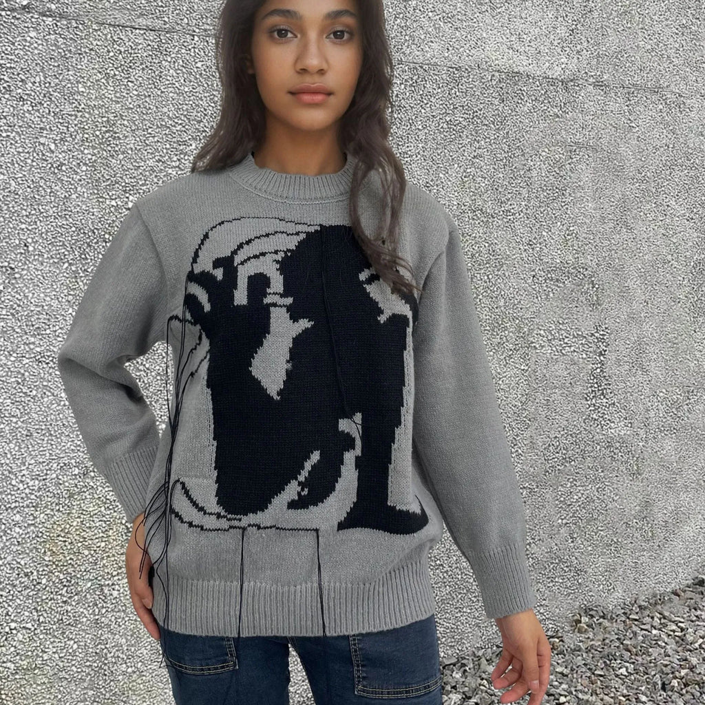 Women's grey alpaca wool sweater with tassel design and abstract pattern
