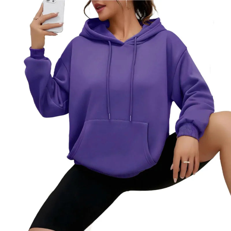 Loose fit women's sweatshirt with drawstring and pocket detail in various colour options