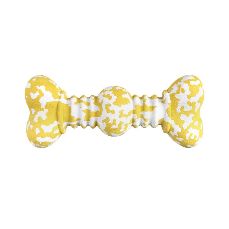 Green, white, and yellow camouflage pattern natural rubber bone chew toy for large breed dogs on a plain background.