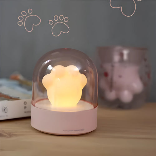 Grey and pink cat paw shaped USB rechargeable night light with adjustable brightness and musical rotation features