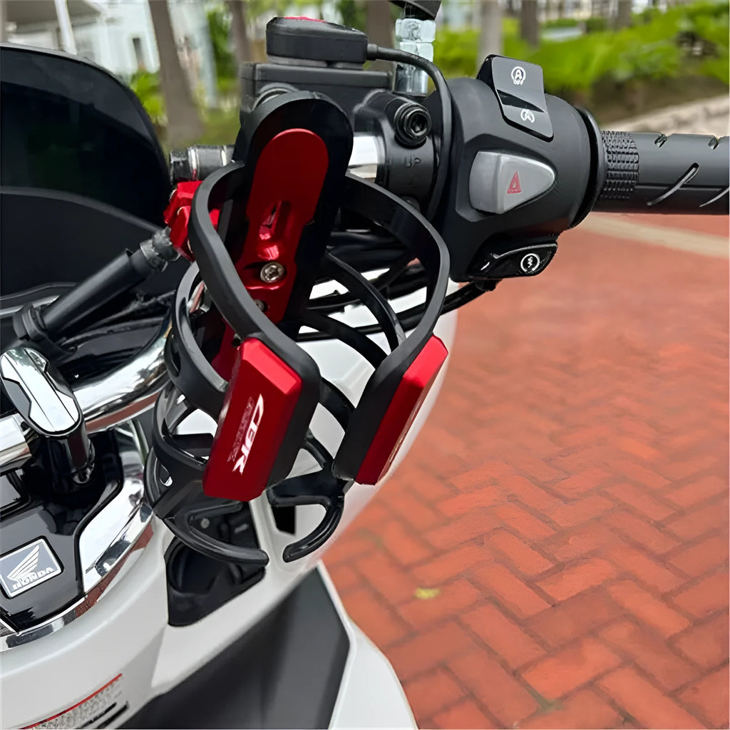 Modified water bottle cage mounted on Honda X-ADV scooter bumper in multiple colour options